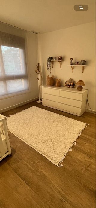 Alfombra beige de tela