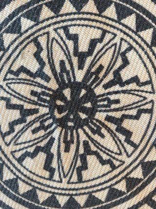 Alfombra redonda beige y negra