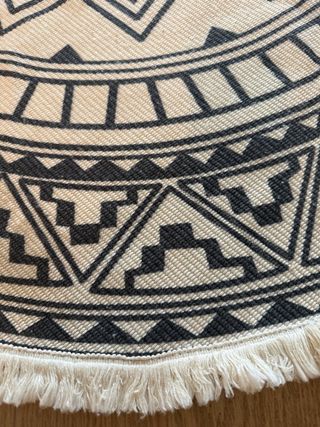 Alfombra redonda beige y negra