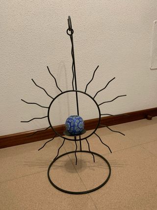 Portacandele a forma di sole in metallo