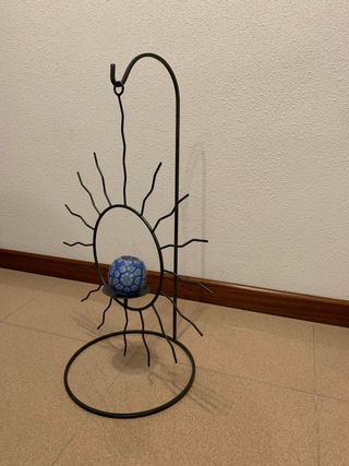 Portacandele a forma di sole in metallo
