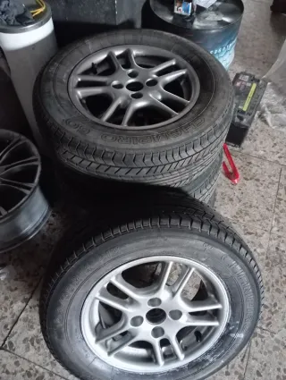 Llantas 14 pulgadas 4x100 con gomas