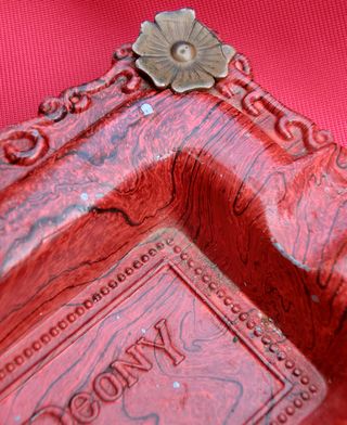 ORIGINAL CENICERO PUBLICIDAD PEONY METAL FUMADOR