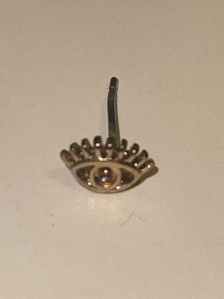 Orecchino singolo occhio dorato senza gancetto