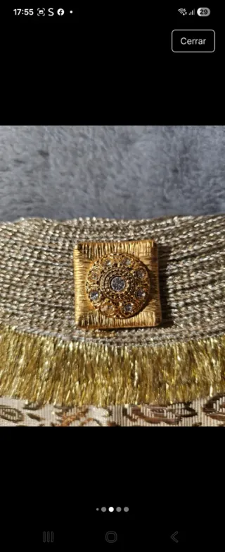 Bolso de fiesta dorado con aplicaciones