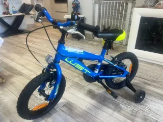 Bicicleta infantil azul poco uso