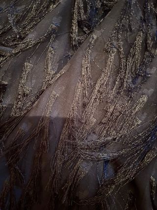 Falda negra con flecos