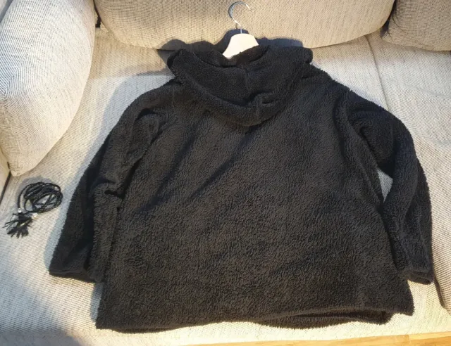 Chaqueta de rizo negra extra suave y cálida.