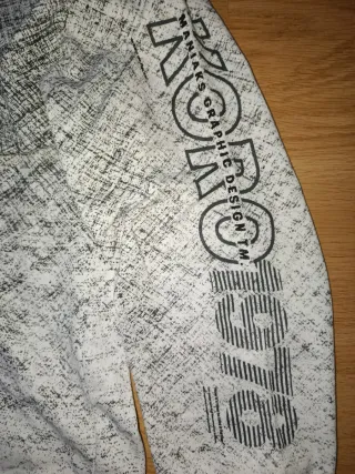 Sudadera Koroshi gris y blanca talla M.