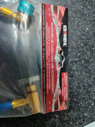 Manguera recarga A/A con manómetro.