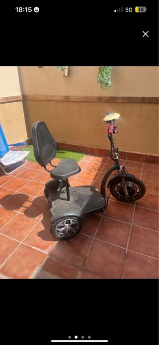 Triciclo eléctrico con asiento
