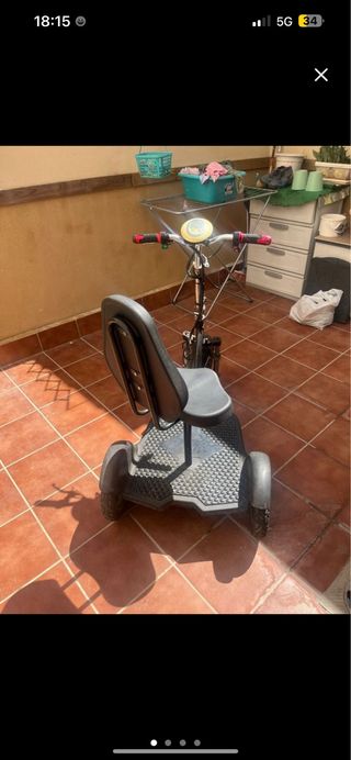 Triciclo eléctrico con asiento
