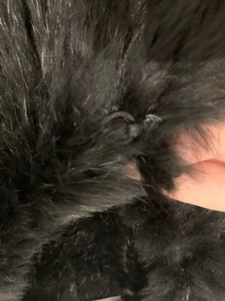 Abrigo de pelo negro