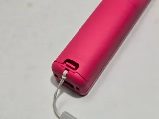 Controller rosa + 1 controller Wii con MotionPlus rosso originale