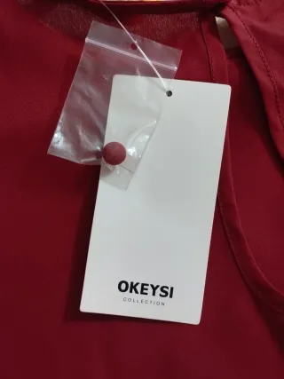 Blusa color burdeos plisada