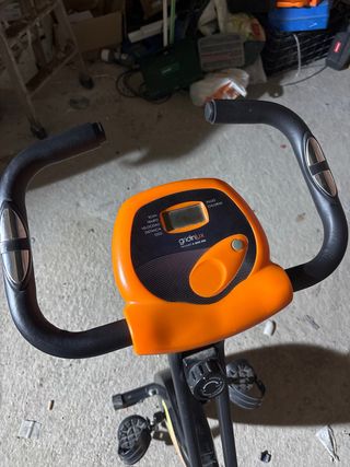 Bicicleta Estática Naranja y Negra Marca Gridinlux