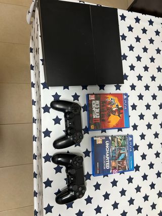 PS4 (Playstation 4) con 2 mandos y juegos