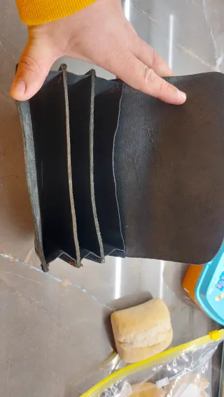 Monedero de cuero repartidor