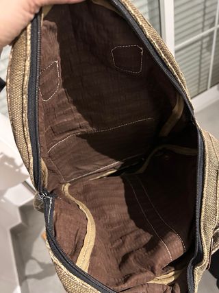 Mochila de tela con detalles en piel