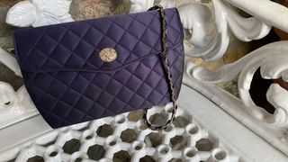Bolso fiesta El Corte Inglés morado y dorado