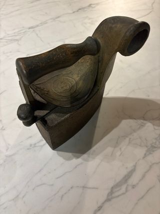 Plancha antigua de carbón