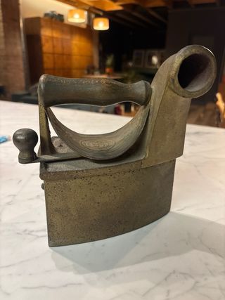 Plancha antigua de carbón