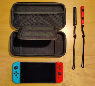 Nintendo Switch + Custodia + Stand + SD 128GB