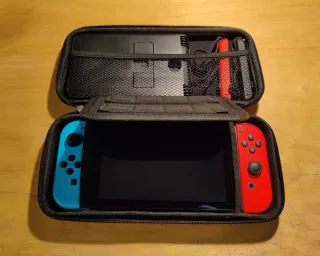 Nintendo Switch + Custodia + Stand + SD 128GB