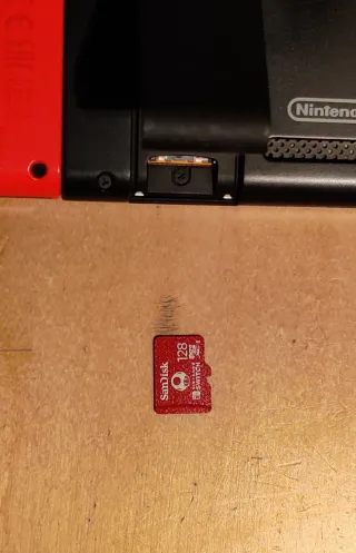 Nintendo Switch + Custodia + Stand + SD 128GB