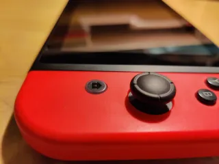 Nintendo Switch + Custodia + Stand + SD 128GB