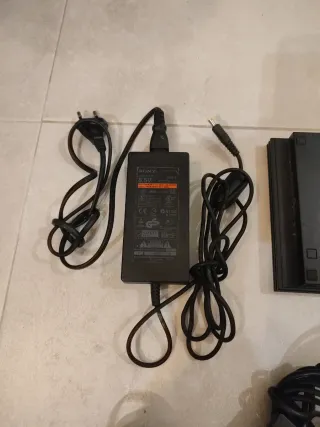 Consola PlayStation 2 con mandos y bolsa