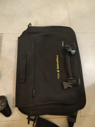 Consola PlayStation 2 con mandos y bolsa