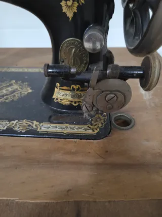 Maquinaria antigua de coser Singer