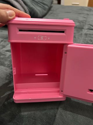 Hucha de juguete infantil rosa con clave y huella