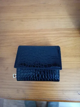 Cartera Parfois piel negra.