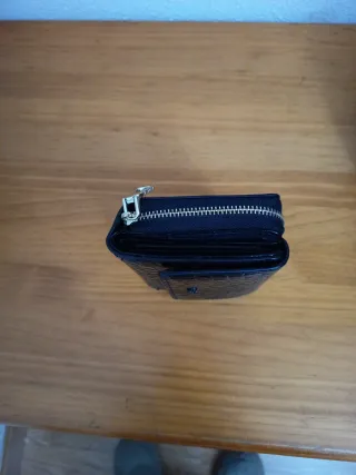 Cartera Parfois piel negra.