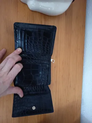 Cartera Parfois piel negra.