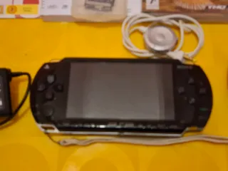 Sony PSP-1004K Negra + Accesorios