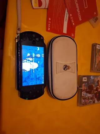 Sony PSP-1004K Negra + Accesorios