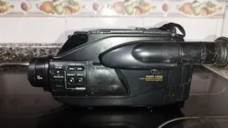 Cámara Sanyo Vintage Negra y trasportín