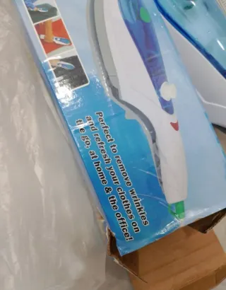 Cepillo de vapor portátil para ropa