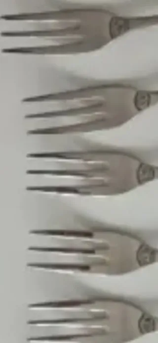 Juego de cubiertos de metal plateado 15 tenedores