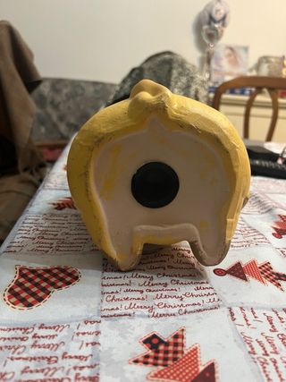 Salvadanaio maialino in ceramica con pallone