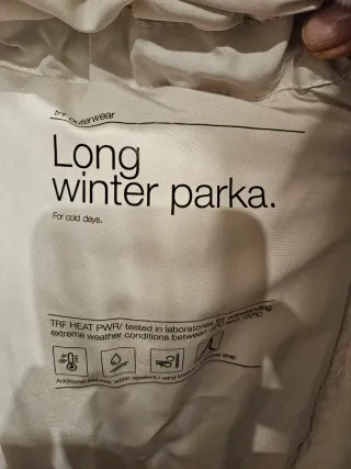 Plumífero Zara blanco con capucha