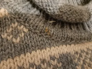 Jersey Devold cuello alto estampado