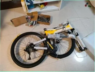 Bicicleta plegable amarilla