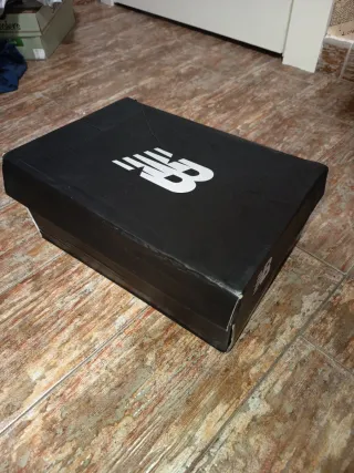 Zapatillas New Balance Blancas y Grises