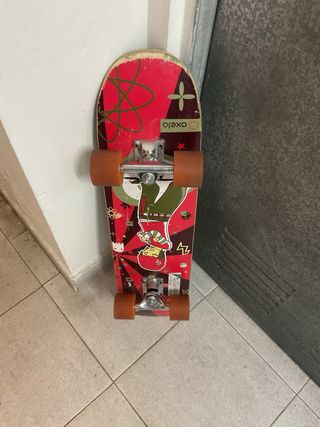 Skate Negro con Ruedas Naranjas