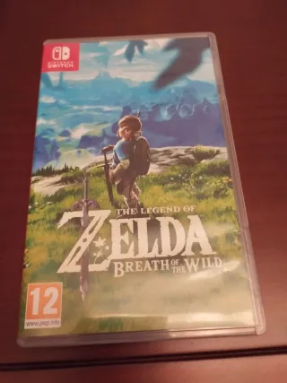 Nintendo Switch OLED Blanca + Mando + Juego +Funda