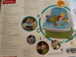 Alzador de asiento Fisher Price plegable